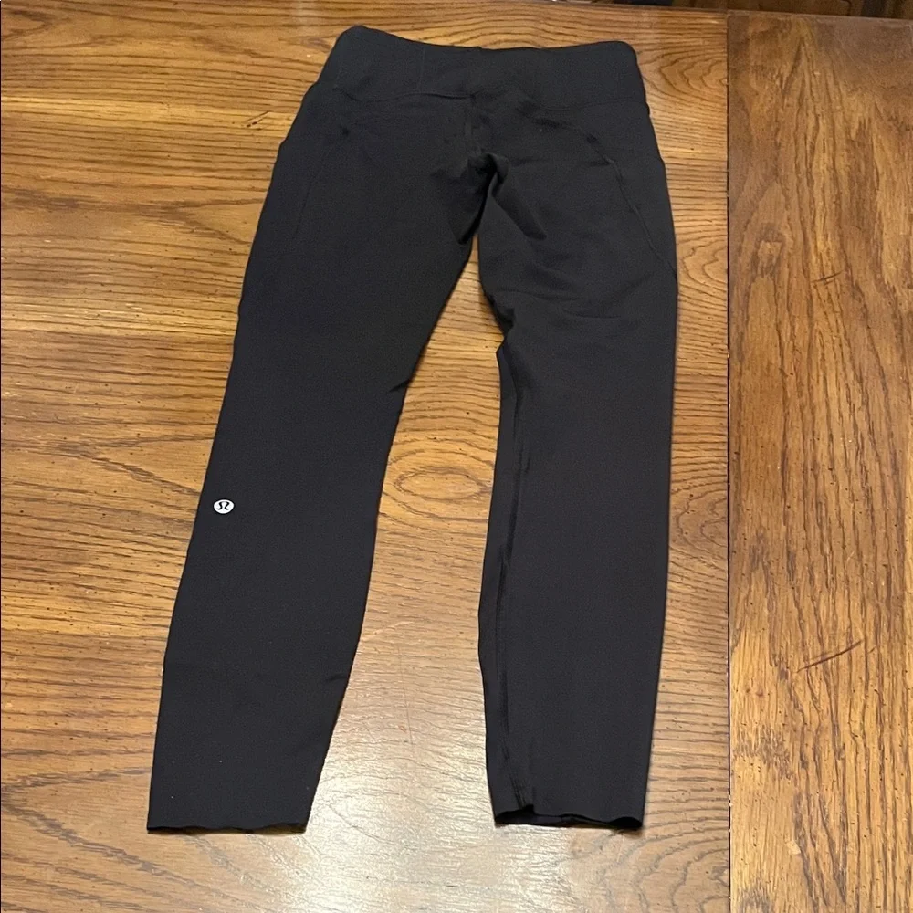 Lululemon Black High-Waisted 7/8 Leggings with‎ Reflective Detail, size 4